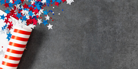 4th of July American Independence Day. Presidents Day. Red, blue and white star confetti, decorations on gray stone background. Flat lay, top view, copy space, banner