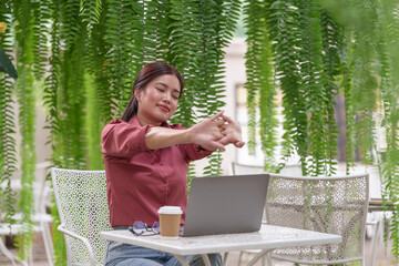 Independent lifestyle woman uses laptop to work and relax. Exercise, outdoors, coffee shops,...