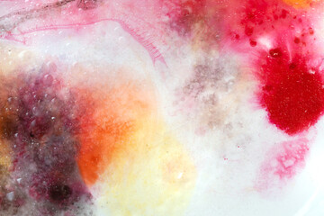 Abstract art with pink, red and yellow watercolour splashes and dots for creative background or...