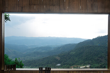 mountain scenery seen through the window frames