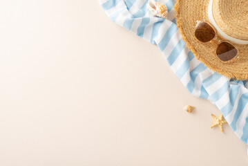 Tropical daydream display: Top view perspective of straw hat, shades, blanket for sunbathing,...
