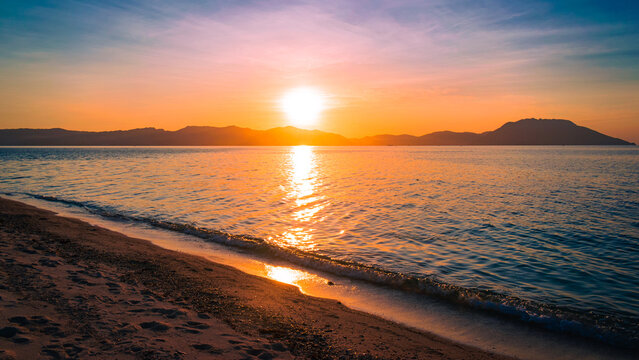 Golden sunset at sea. Bonbon Beach, Romblon Island, Philippines