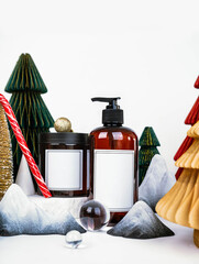 dark jar with lid and dispenser on the background of Christmas decorations, side view