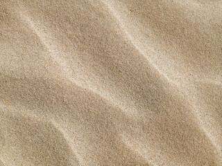 Fototapeta na wymiar light and shade sand patterns at umina beach