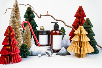 dark jar with lid and dispenser on the background of Christmas decorations, side view