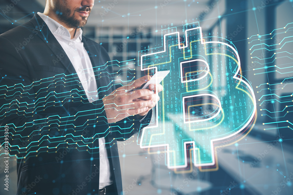 Poster close up of businessman hands using cellphone with digital bitcoin sign and circuit on blurry office