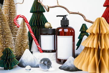 dark jar with lid and dispenser on the background of Christmas decorations, side view