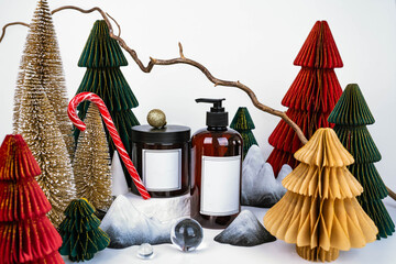 dark jar with lid and dispenser on the background of Christmas decorations, side view