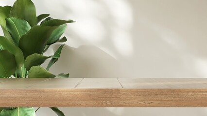 Minimal wooden counter table, green tropical tree plant in dappled sunlight, leaf shadow on beige...