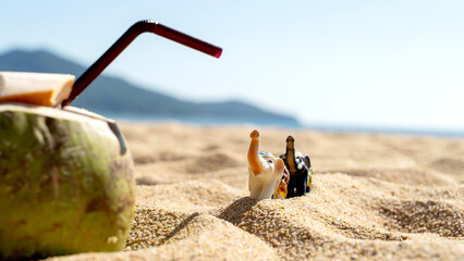 figurine of elephants on the sandy beach. exotic vacation or vacation concept