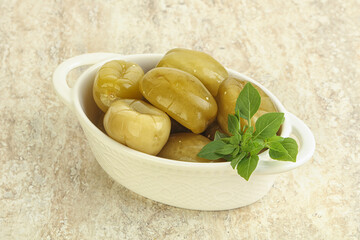 Pickled green tomato in the bowl