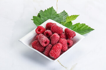 Rope sweet juicy raspberry heap