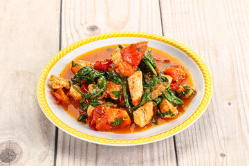Chicken with tomato and spinach