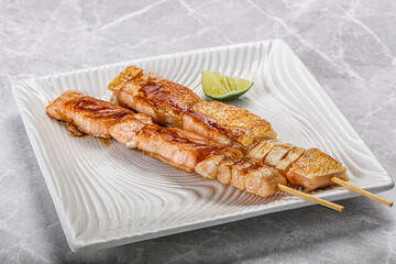 Grilled salmon skewer with sauce