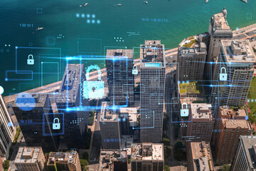 Aerial view of a city with holographic security concept overlays, featuring buildings, roads, and...