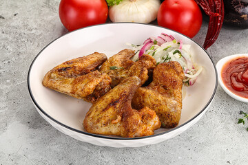 Grilled chicken wings with sauce