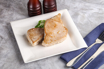 Roasted red tuna steak in the plate