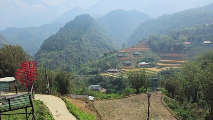 Hills, mountain, terraced fields and traditional houses in Sapa town, lao Cai province, Vietnam in...