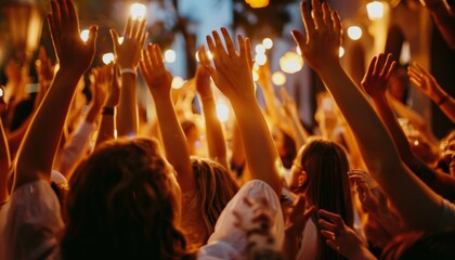 Crowd Raising Hands at Outdoor Festival.