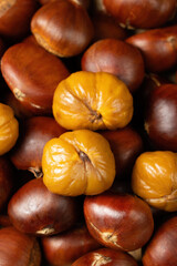 close up of peeled roasted chestnut  background.