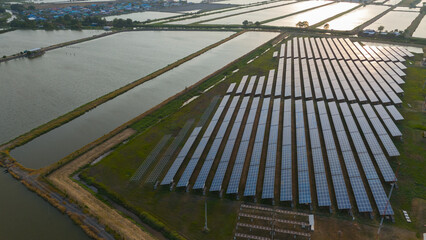 Solar cells farming beside with rivers and factories in industrial area. Green World concept with...