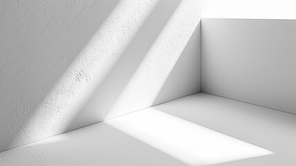 A white room with a corner that is lit by the sun