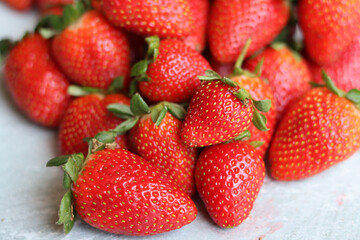 Strawberry background. Juicy organic berries close up photo. Summer fruit texture. Fresh...