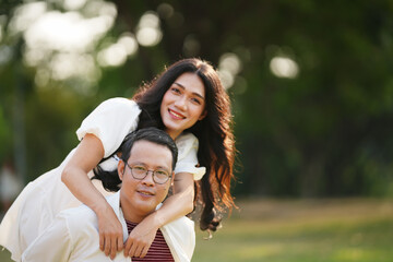 Beautiful young couple outdoors in the park. Portraits of lovers. Autumn. Spring. Holiday Valentine's Day.