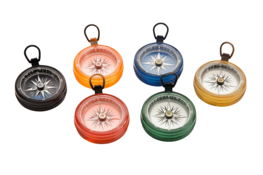 Navigating Dreams: A Quartet of Compass Keychains. On a White or Clear Surface PNG Transparent Background.