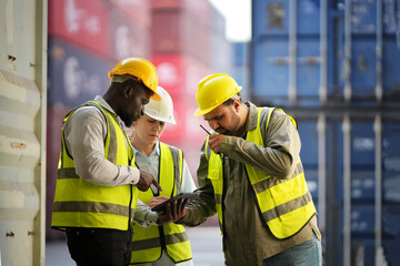 Foreman control loading containers box from cargo freight ship for import export, Foreman control industrial container cargo freight ship, Business logistic concept, Import and export concept