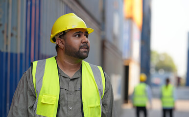 Foreman control loading containers box from cargo freight ship for import export, Foreman control industrial container cargo freight ship, Business logistic concept, Import and export concept