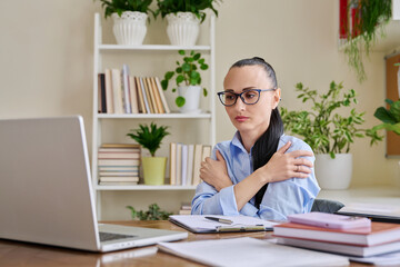 Female therapist, psychologist showing breathing practice on web camera laptop