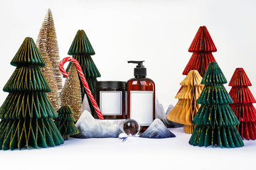 dark jar with lid and dispenser on the background of Christmas decorations, side view