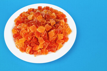 pieces of candied papaya on a plate