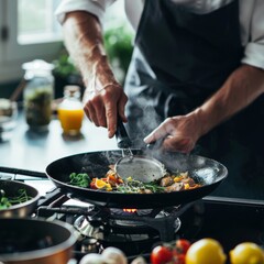 Professional chef cooking delicious meal in restaurant kitchen
