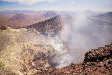 Volcano in the Andes with fumes (smoke)