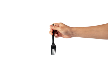 Black plastic fork in hand on transparent background