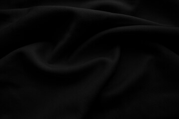 Black cloth blackground. Dark wavy fabtic.