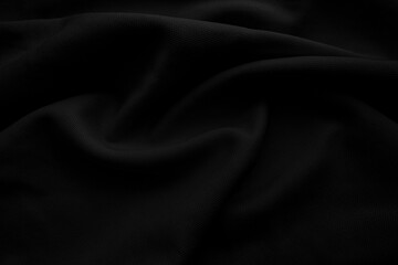 Fototapeta premium Black cloth blackground. Dark wavy fabtic.