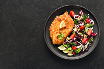 Chicken schnitzel and vegetable salad