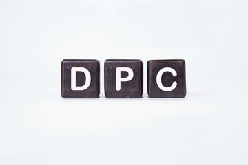 DPC letter on cubes on a white background.