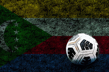 Football ball and field with Comoros flag, soccer ball and national flag, soccer cup idea, Comoros 