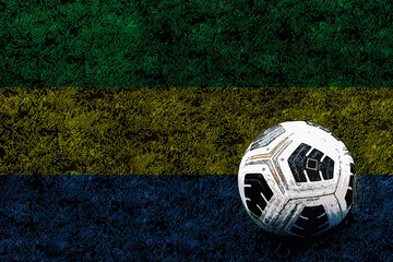 Football ball and field with Gabon flag, victory and win concept, tournament or competition, Gabon 
