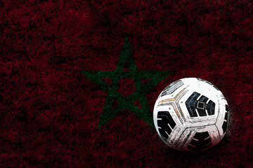 Football ball and field with Morocco flag, Morocco football team, victory and win concept, soccer 