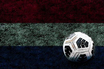 Football ball and field with Netherlands flag, Netherlands football team, victory and win concept