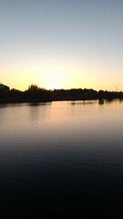 Fototapeta premium sunset over the river