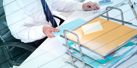 Businessman taking a record of his paper tray, geometric pattern