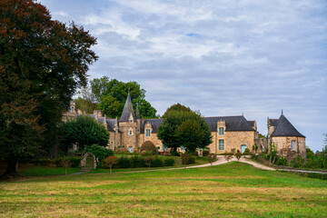 Fototapeta na wymiar View of Castle Park Rochefort en Terre on a cloudy day. Photography taken in Brittany, France.