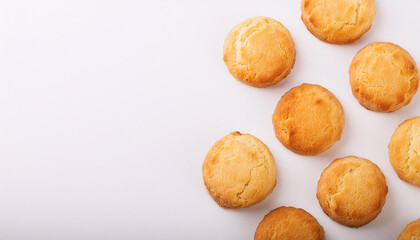 Freshly baked buttermilk biscuits on white table. Tasty cookies. Delicious snack. Homemade bakery.