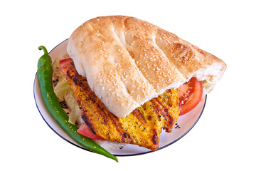 Chicken sandwich on decorated plate on wooden textured table